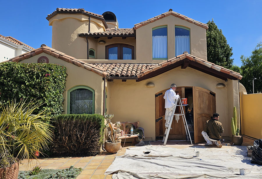 Exterior painting of stucco home